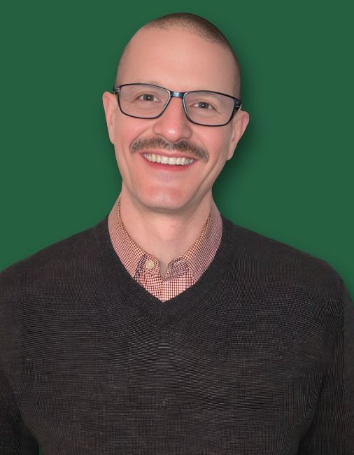 Headshot with carlisle thundering herd green for Derek Bicksler, Top Rated and over twenty years experience Real Estate Agent in Carlisle, Pennsylvania - Listing homes for sale and seller representation specialist