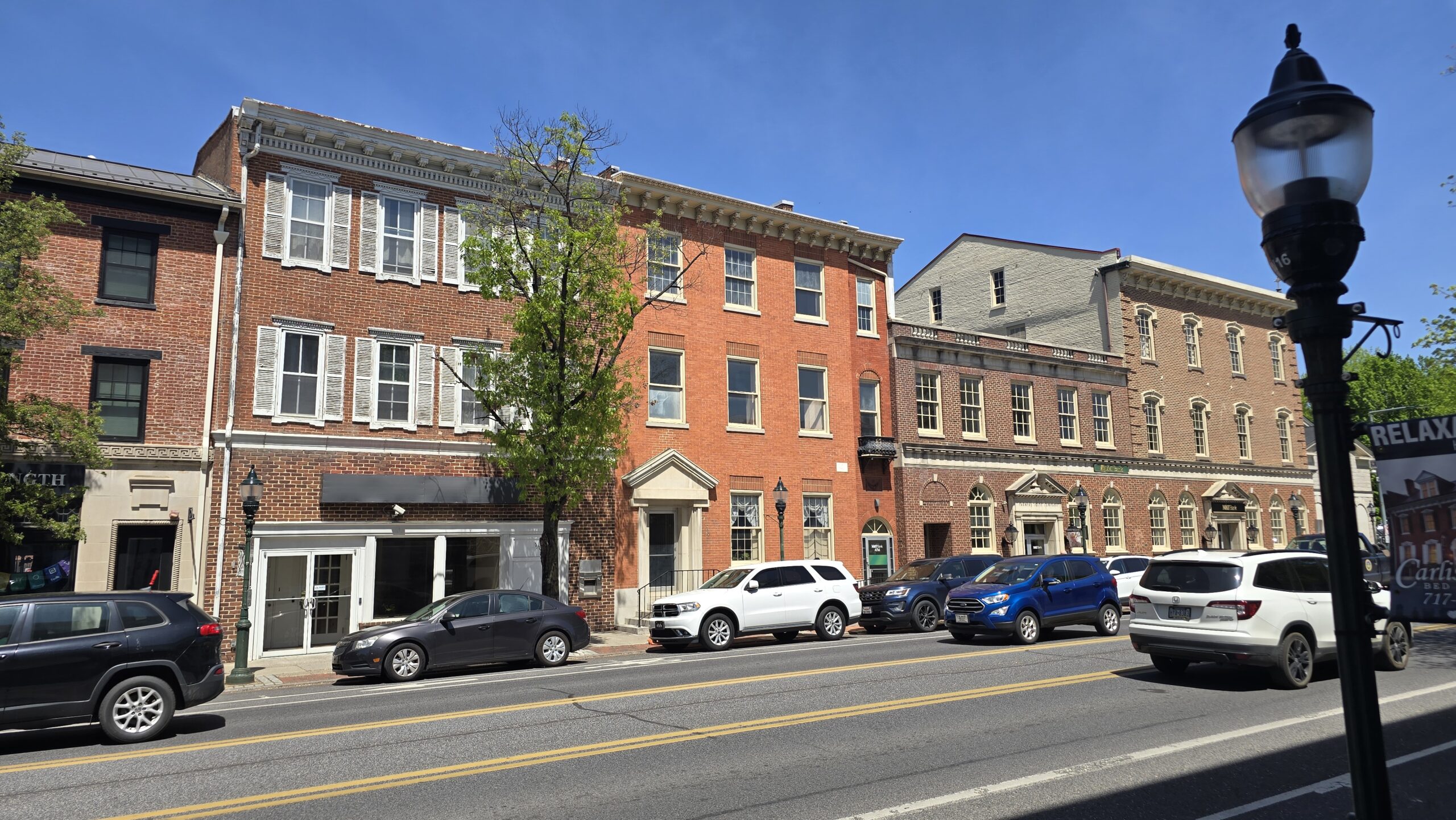 w high street in carlisle, pa on a sunny pure blue sky day