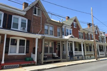 a row of townhomes on west pomfret street in carlisle pa
